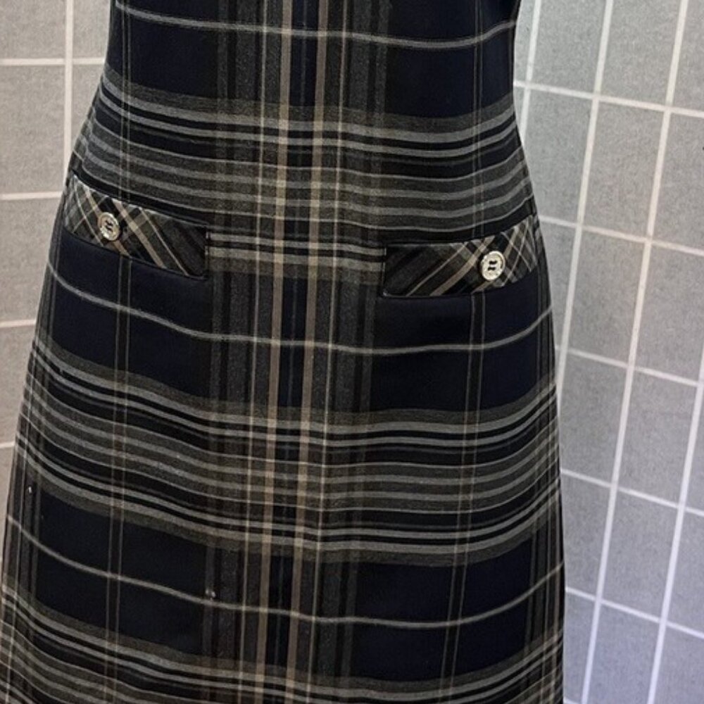 This is a Tommy Hilfiger plaid sleeveless sheath dress.